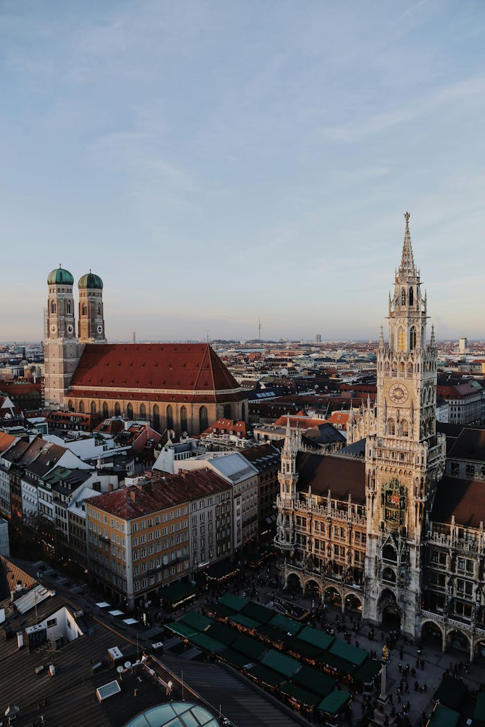A stunning aerial view of Marienplatz with the iconic Frauenkirche and Neues Rathaus in Munich, Germany.