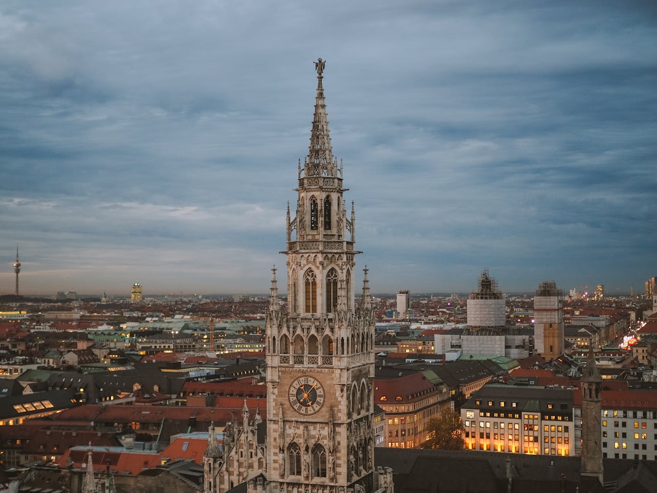 A stunning view of Munich's New Town Hall at dusk showcasing its Gothic architecture.
